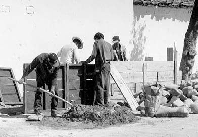 Villagers construct the wheelchair ramp in Ajoya.