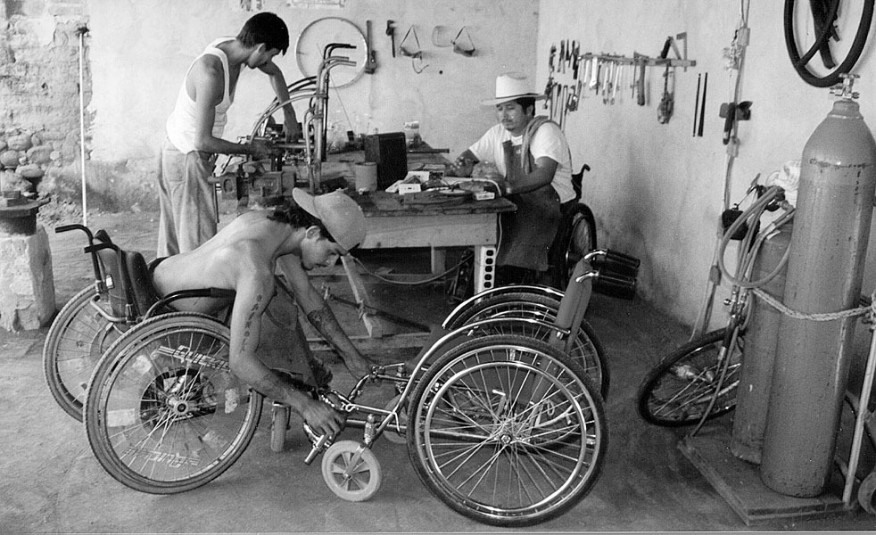 Photos of Alejandro—now 18 years old—working in the new Children’s Wheelchair shop.