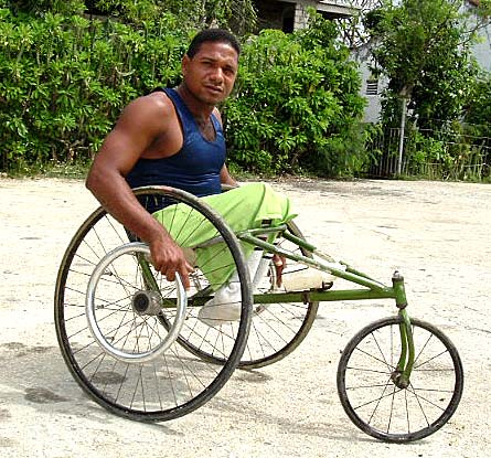 This young man, a Special Olympics athlete, has run international races. His racing wheelchair was made in the workshop of the Association of Physically Disabled Persons in Bayamo.