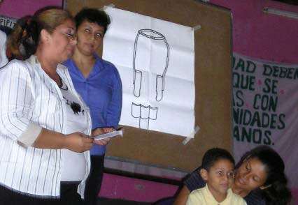 Christopher and his parents help to present the design for the torsion cables.