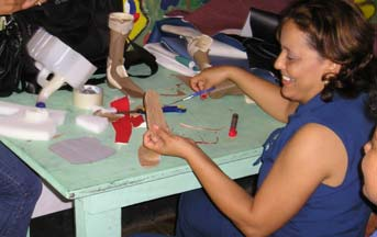 Making the cardboard foot wedge.