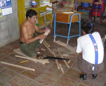 Two local carpenters, one disabled, were very creative and highly sensitive to the children’s needs. Here one works on Joarling’s crutches.