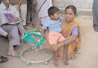 The mother of a child with cerebral palsy tried in vain to get him to walk in this broken walker.