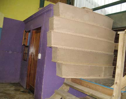 Low cost wooden coffins and crosses help poor families spend less on deaths from AIDS.