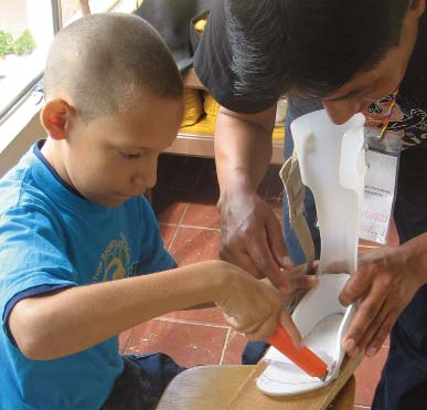 Walter David cuts off the ends of his own braces to see if they’ll work better.