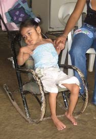 The special seat that had been build specifically for María didn’t work as well for her as did a simple child’s rocker. 