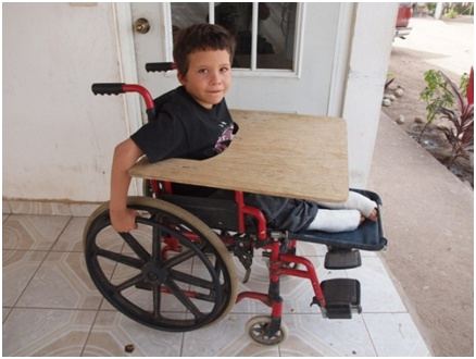 Miguel’s wheelchair with custom designed removable table.