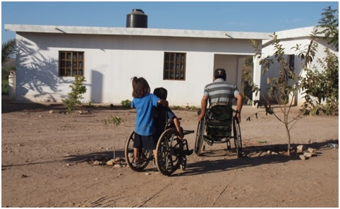 This "taxi service" serves as good exercise for strengthening his arms. If the boy is going to learn to walk with crutches, he will need strong arms.