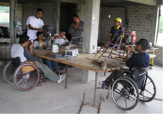 The team of disabled workers at PROJIMO Duranguito make custom-designed wheelchairs for disabled children.