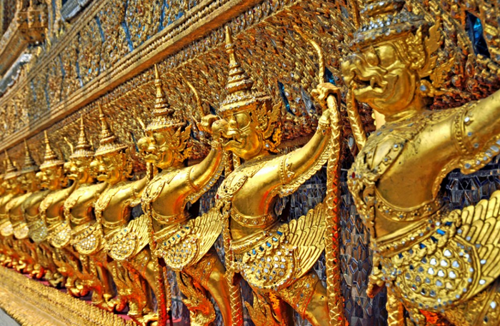 Thailand, for all its rapid modernization, is still rooted in Buddhist traditions and art. Wat Phra Kaew (Temple of the Emerald Buddha), on the grounds of the Grand Palace in Bangkok, is considered the most sacred Buddhist temple in the country. (Photo by Dennis Jarvis.)