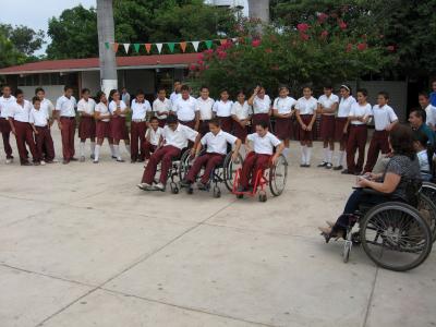 Students in wheelchairs at school.